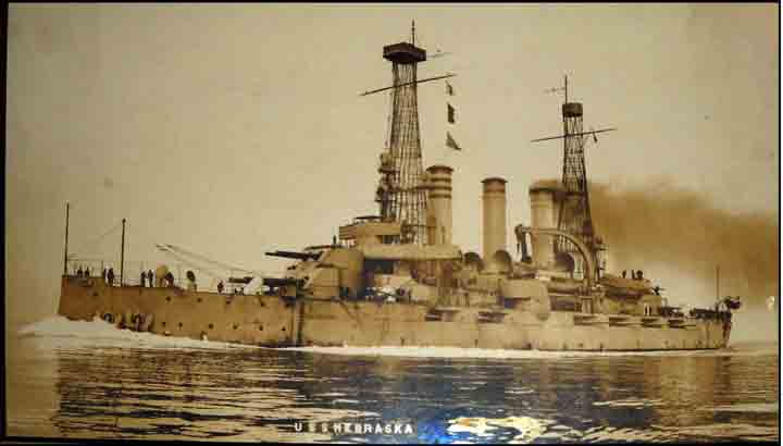 After the cruise, Nebraska was fitted with cage towers around the mast as shown in the photograph.
